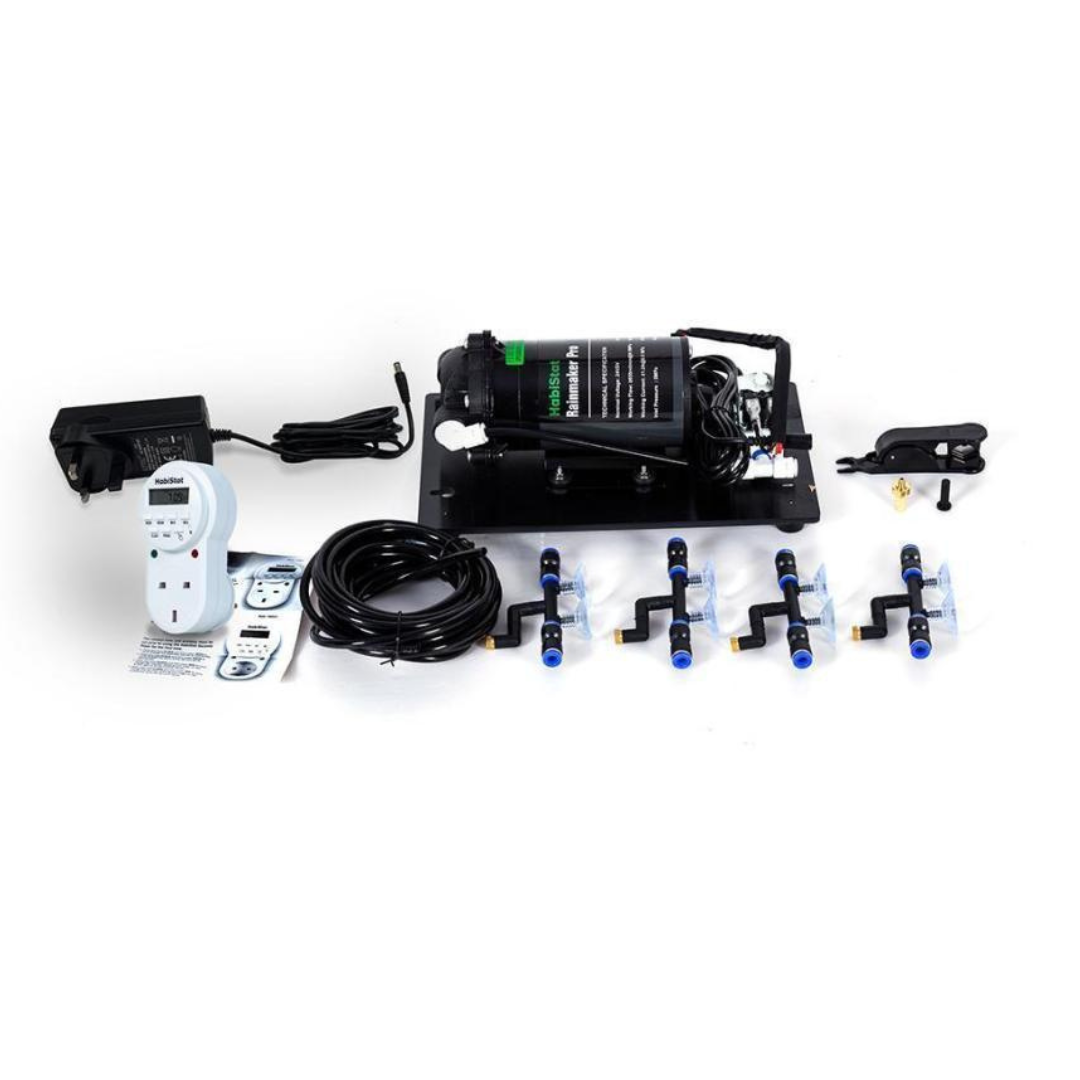 The HabiStat Rainmaker Pro by ReptiChip LLC is a reptile terrarium misting kit with a black pump, power adapter, timer, long cables, instructions, mounting hardware, and four aligned spray nozzles for automated humidity control.
